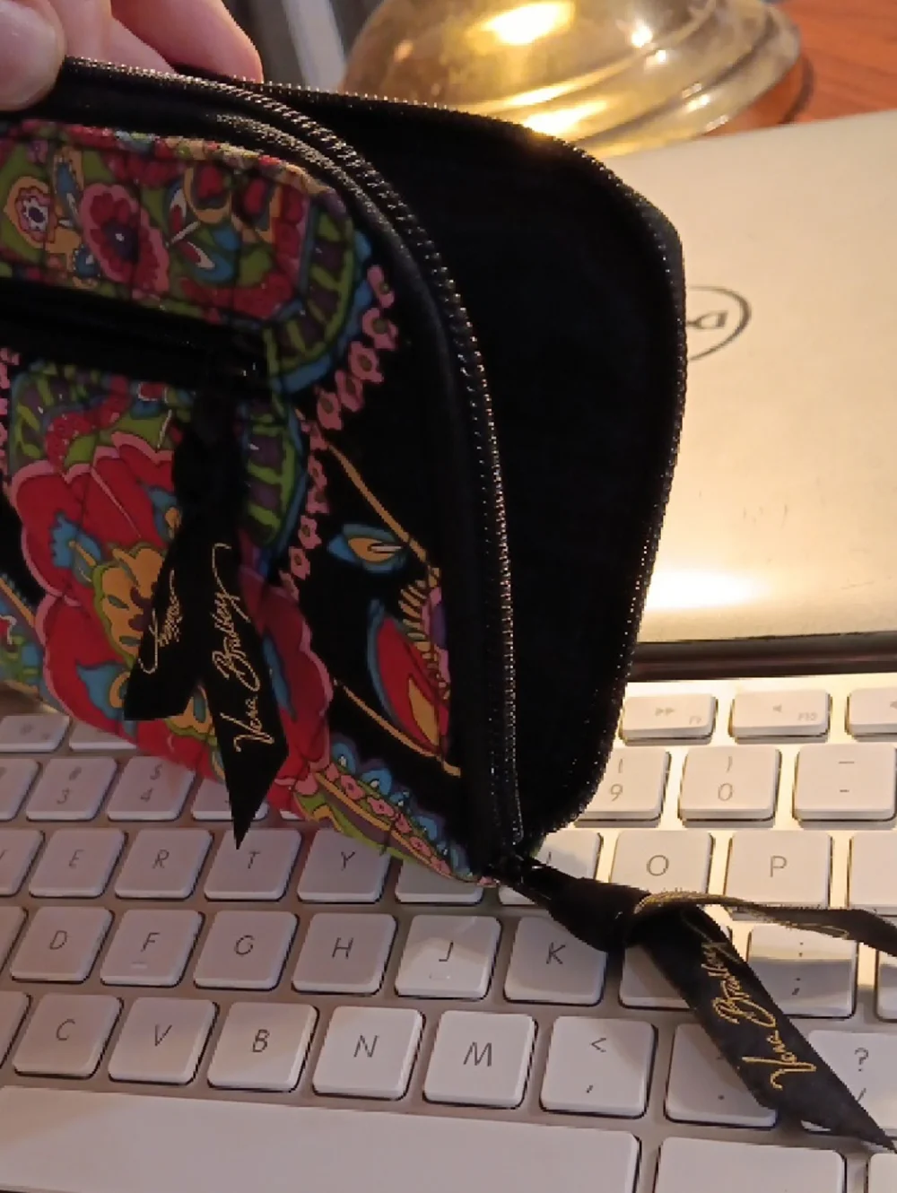 Vera Bradley zip-around wallet featuring the "Symphony in Hue" quilted Pattern - Picture 7 of 8